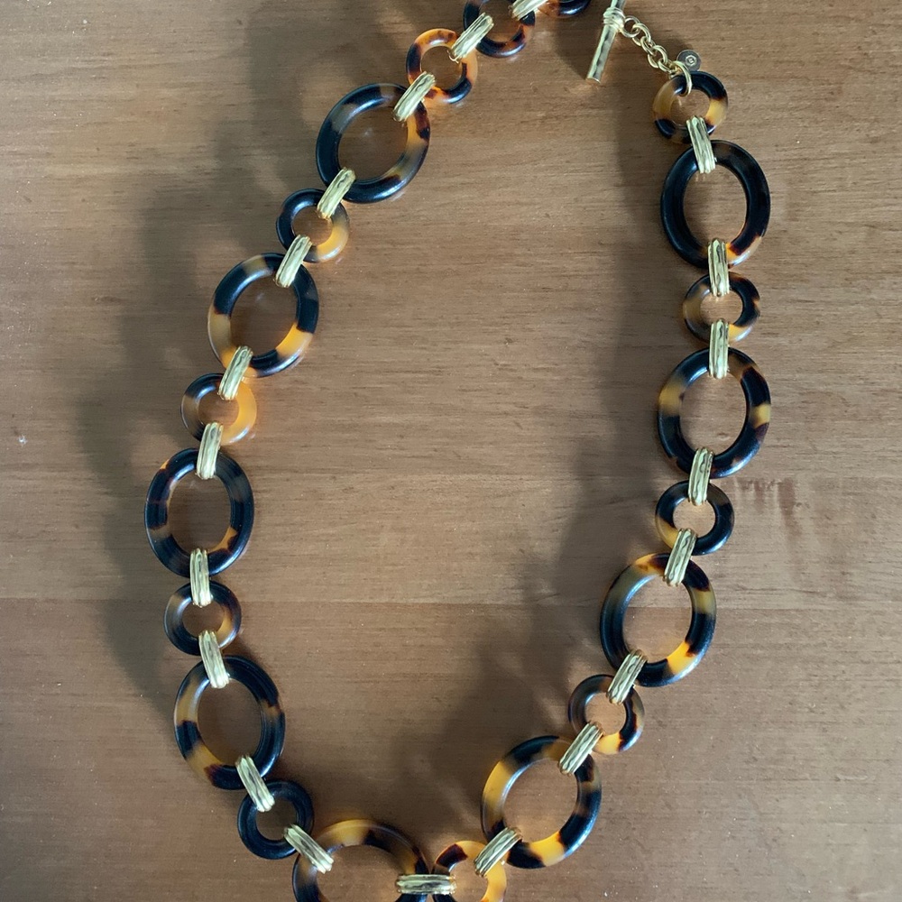 Gold Necklace with Open Circular Links and Playful Marbled Pattern
